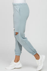 Light Blue Ripped Knee Sweatpants