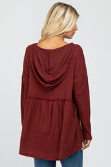 Rust Waffle Knit Hooded Peplum Top