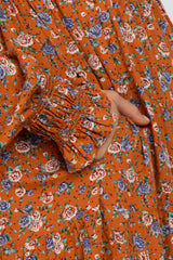 Rust Floral Long Sleeve Smocked Maternity Maxi Dress