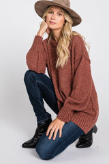 Rust Textured Knit Exposed Seam Sweater