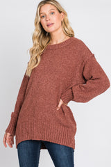 Rust Textured Knit Exposed Seam Sweater