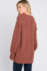 Rust Textured Knit Exposed Seam Sweater