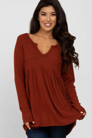 Rust Ribbed Split Neck Peplum Top