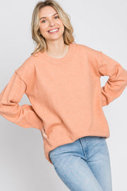 Peach Exposed Seam Sweater