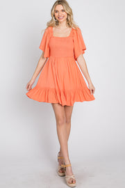 Coral Smocked Tie Back Dress