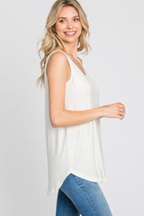 Cream Sleeveless Curved Hem Top