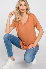 Camel Pocket Front Curved Hem Top