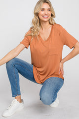 Camel Pocket Front Curved Hem Top