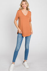 Camel Pocket Front Curved Hem Top