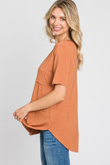 Camel Pocket Front Curved Hem Top