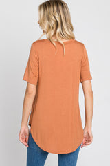 Camel Pocket Front Curved Hem Top