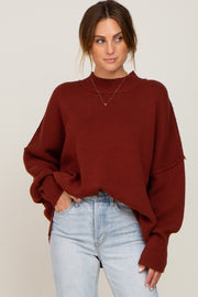 Rust Mock Neck Exposed Seam Sweater