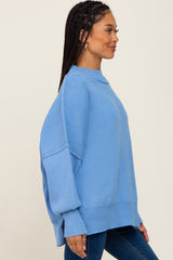 Light Blue Mock Neck Exposed Seam Sweater