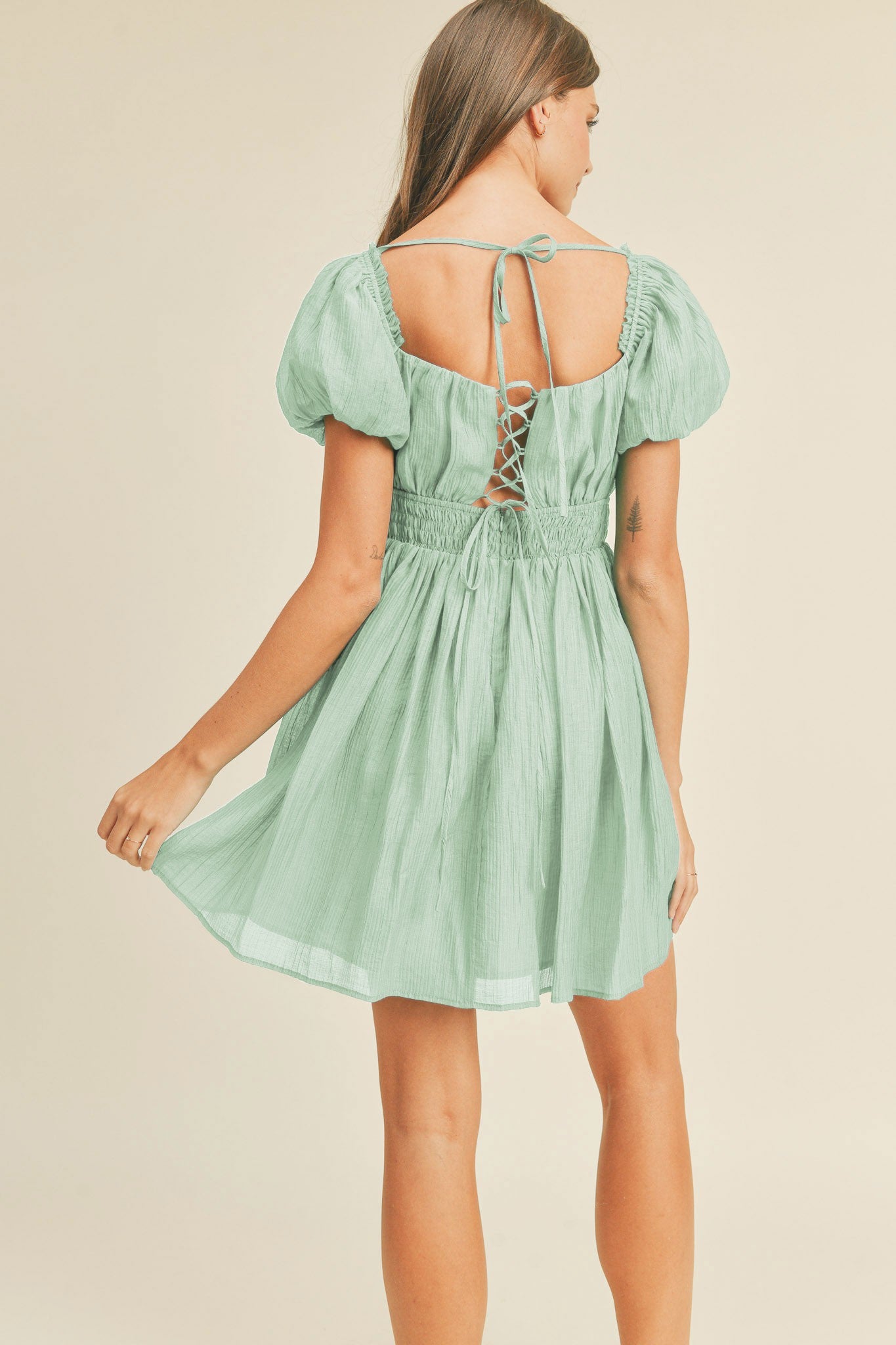 Naked Wardrobe lace up back mini dress in light green - ShopStyle